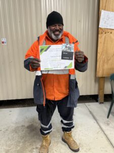 Epesio “Eps” Hankin receives the Runner-Up Award for May 2025 from the Mulgoa Road Upgrade Alliance, representing Southern Cross Traffic.